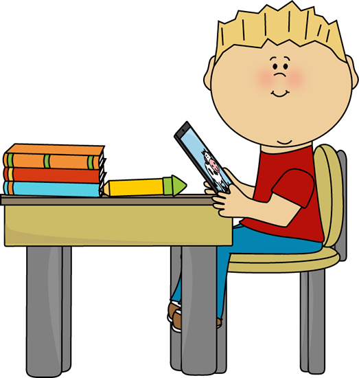 Boy_Sitting_at_School_Desk_with_a_Tablet